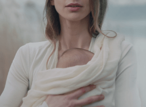 
                Healthy woman caring for her child
                